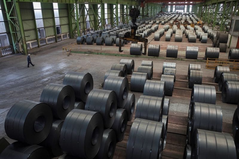 Китайские акции выросли благодаря стали и сельхозсектору От Reuters